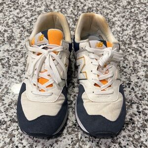 New Balance White and Dark Blue Sneakers with Orange Accents